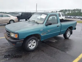 1994 Mazda B-Series Truck z VIN 4F4CR12A9RTM90195, wystawiony jako IAAI lot #42341674 z przebiegiem 120 646 mil mil oraz . Historia ofert i sprzedaży dostępna na DreamBid. Obrazek 2.