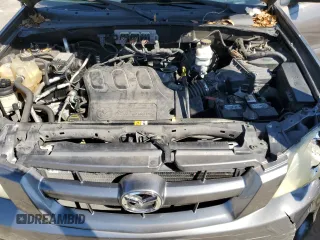 2006 Mazda Tribute S with VIN 4F2YZ041X6KM24035, listed as a Copart auction lot 45943285 with 105,040 mi miles and Salvage Title. Bid and sale history available at DreamBid. Image 12.