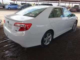 2014 Toyota Camry Hybrid LE with VIN 4T1BD1FK6EU132834, listed as a IAAI auction lot 41927444 with 93,739 mi miles. Bid and sale history available at carsss.com. Image 4.