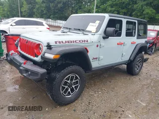 2024 Jeep Wrangler Rubicon with VIN 1C4PJXFG4RW160501, listed as a IAAI auction lot 42366618 with 16,515 mi miles and . Bid and sale history available at DreamBid. Image 2.