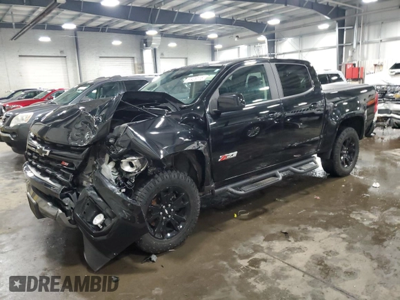 2021 Chevrolet Colorado 4WD Z71 with VIN 1GCGTDEN8M1171810, listed as a Copart auction lot 57409115 with 100,579 mi miles and Salvage title. Bid and sale history available at DreamBid. Image 1.
