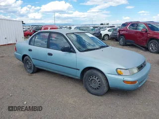 1994 Toyota Corolla Deluxe with VIN 2T1AE09B7RC058832, listed as a IAAI auction lot 39698171 with 257,813 mi miles and . Bid and sale history available at DreamBid. Image 1.