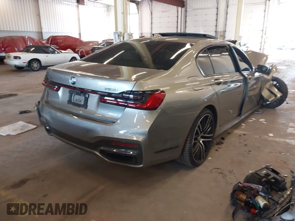 2020 BMW 7 Series 750i xDrive with VIN WBA7U2C07LGJ59164, listed as a IAAI auction lot 42001056 with Not provided miles and . Bid and sale history available at DreamBid. Image 4.