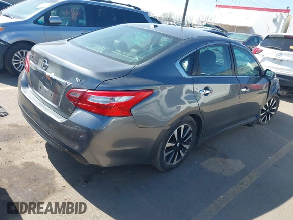 2018 Nissan Altima SR with VIN 1N4AL3AP5JC243138, listed as a IAAI auction lot 41750643 with 123,601 mi miles and . Bid and sale history available at carsss.com. Image 4.