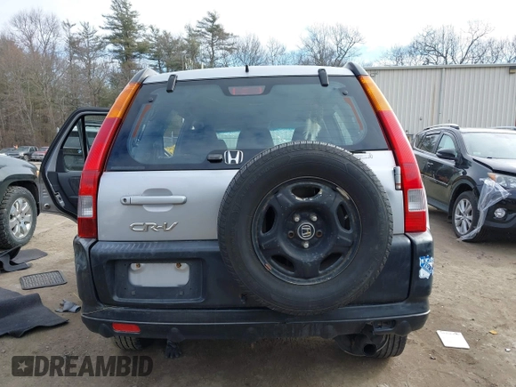 2002 Honda CR-V LX z VIN JHLRD78532C050707, wystawiony jako IAAI lot #41704967 z przebiegiem 306 564 mil mil oraz . Historia ofert i sprzedaży dostępna na DreamBid. Obrazek 17.