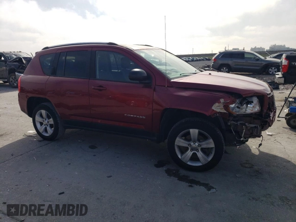 2012 Jeep Compass Sport with VIN 1C4NJCBA5CD678721, listed as a Copart auction lot 50605465 with 204,527 mi miles and Salvage Title. Bid and sale history available at carsss.com. Image 4.