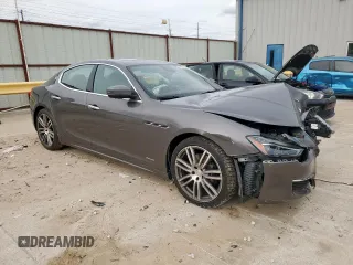 2018 Maserati Ghibli S Q4 GranLusso z VIN ZAM57YTL8J1265648, wystawiony jako Copart lot #56295795 z przebiegiem 51 857 mil mil oraz Szkoda całkowita • Salvage title. Historia ofert i sprzedaży dostępna na DreamBid. Obrazek 4.