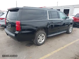 2019 Chevrolet Suburban LT with VIN 1GNSKHKC0KR159583, listed as a IAAI auction lot 41309350 with 196,844 mi miles. Bid and sale history available at carsss.com. Image 4.