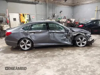 2019 Honda Accord Touring with VIN 1HGCV2F99KA031634, listed as a IAAI auction lot 41209019 with 74,965 mi miles and . Bid and sale history available at DreamBid. Image 13.