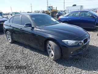 2013 BMW 3 Series 328i xDrive with VIN WBA3B5G58DNS02841, listed as a IAAI auction lot 41924431 with 106,981 mi miles. Bid and sale history available at carsss.com. Image 1.