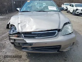 2000 Honda Civic LX with VIN 1HGEJ6574YL029220, listed as a IAAI auction lot 41669636 with 248,232 mi miles and . Bid and sale history available at carsss.com. Image 18.