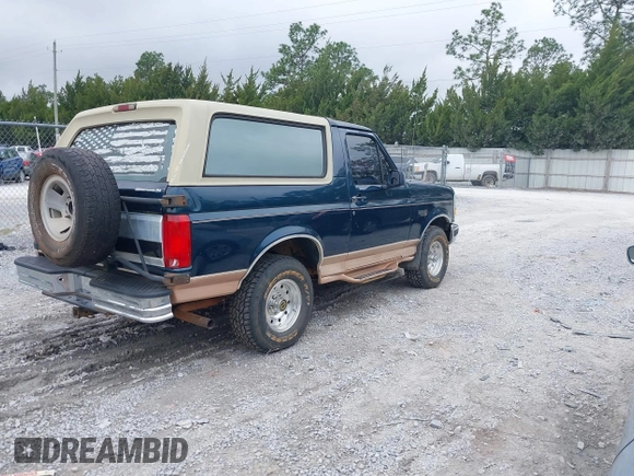 1995 Ford Bronco Custom with VIN 1FMEU15H2SLB87303, listed as a IAAI auction lot 41763857 with 1 mi miles. Bid and sale history available at carsss.com. Image 4.