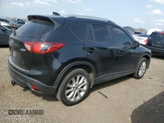 2015 Mazda CX-5 Grand Touring with VIN JM3KE4DY9F0516357, listed as a Copart auction lot 53156215 with 118,621 mi miles and Salvage Title. Bid and sale history available at DreamBid. Image 3.