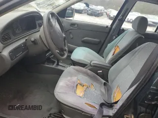 1996 Kia Sephia RS z VIN KNAFA1256T5265533, wystawiony jako Copart lot #48195555 z przebiegiem 225 062 mil mil oraz Szkody całkowita. Historia ofert i sprzedaży dostępna na DreamBid. Obrazek 7.