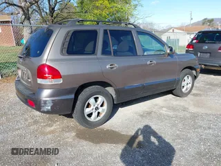 2005 Hyundai Santa Fe GLS with VIN KM8SC13D15U013890, listed as a IAAI auction lot 41917783 with 227,891 mi miles. Bid and sale history available at carsss.com. Image 4.