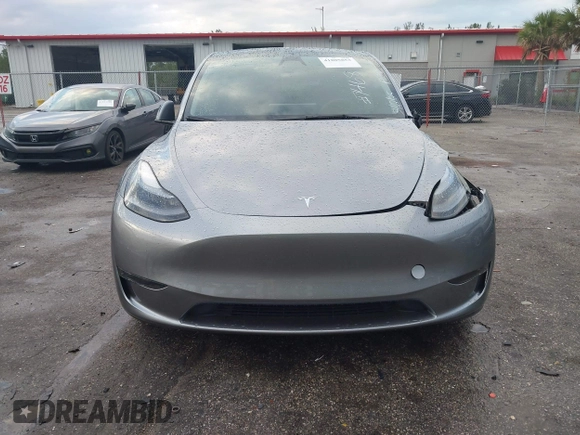 2024 Tesla Model Y Performance with VIN 7SAYGDEF3RA307468, listed as a IAAI auction lot 41805853 with 10,377 mi miles and . Bid and sale history available at DreamBid. Image 11.