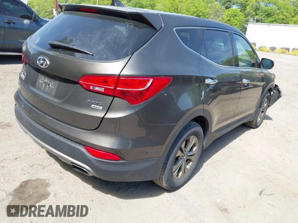 2014 Hyundai Santa Fe with VIN 5XYZTDLB2EG143925, listed as a IAAI auction lot 42243761 with 126,058 mi miles and . Bid and sale history available at DreamBid. Image 4.