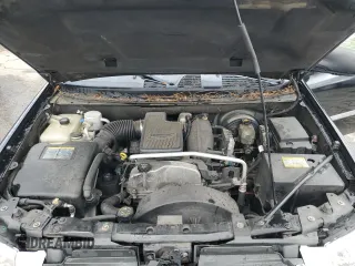 2006 GMC Envoy SLT with VIN 1GKDS13S762258032, listed as a Copart auction lot 88677095 with 184,188 mi miles and Salvage Title. Bid and sale history available at carsss.com. Image 12.