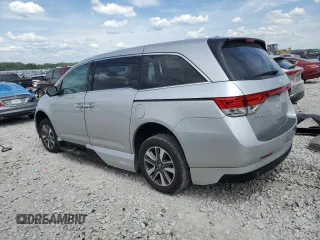 2015 Honda Odyssey Touring Elite z VIN 5FNRL5H93FB041067, wystawiony jako Copart lot #58329355 z przebiegiem 72 000 mil mil oraz Szkoda całkowita • Salvage title. Historia ofert i sprzedaży dostępna na DreamBid. Obrazek 2.