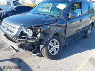 2003 Honda Pilot EX with VIN 2HKYF18633H599550, listed as a IAAI auction lot 41813549 with 242,103 mi miles. Bid and sale history available at carsss.com. Image 6.