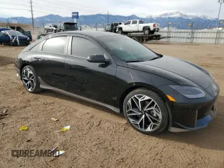 2024 Hyundai IONIQ 6 SEL with VIN KMHM34ACXRA056636, listed as a Copart auction lot 86772594 with 7,054 mi miles and Salvage Title. Bid and sale history available at carsss.com. Image 4.