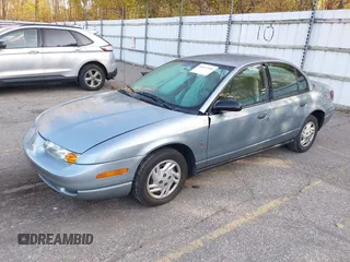 2002 Saturn SL z VIN 1G8ZS528327278417, wystawiony jako IAAI lot #40611406 z przebiegiem 227 283 mil mil oraz . Historia ofert i sprzedaży dostępna na DreamBid. Obrazek 2.