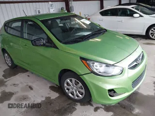 2014 Hyundai Accent GS with VIN KMHCT5AE6EU168619, listed as a IAAI auction lot 41856429 with 227,552 mi miles. Bid and sale history available at carsss.com. Image 1.