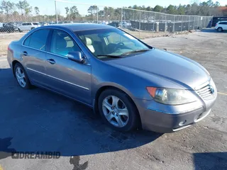 2007 Acura RL Tech Pkg with VIN JH4KB16687C003580, listed as a IAAI auction lot 41739049 with 210,424 mi miles. Bid and sale history available at carsss.com. Image 1.