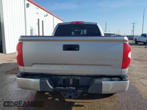 2014 Toyota Tundra SR with VIN 5TFRM5F13EX078411, listed as a IAAI auction lot 42702477 with 123,336 mi miles and . Bid and sale history available at DreamBid. Image 16.