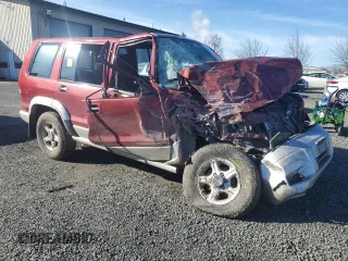 1999 Isuzu Trooper S with VIN JACDJ58X7X7931091, listed as a Copart auction lot 44824285 with Not provided miles and Salvage title. Bid and sale history available at DreamBid. Image 4.