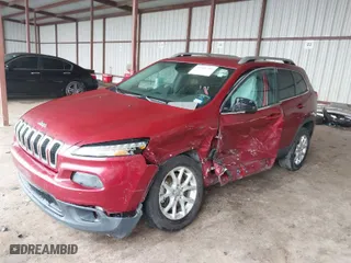 2014 Jeep Cherokee Latitude with VIN 1C4PJLCS5EW252678, listed as a IAAI auction lot 41446486 with 173,125 mi miles. Bid and sale history available at carsss.com. Image 2.