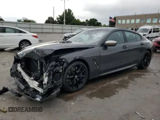 2020 BMW 8 Series M850i with VIN WBAGV8C0XLCD64228, listed as a Copart auction lot 60908315 with 67,643 mi miles and Salvage title. Bid and sale history available at DreamBid. Image 1.