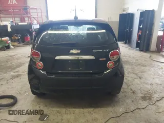 2016 Chevrolet Sonic LTZ z VIN 1G1JE6SB3G4150803, wystawiony jako IAAI lot #42007951 z przebiegiem 124 811 mil mil oraz . Historia ofert i sprzedaży dostępna na DreamBid. Obrazek 16.