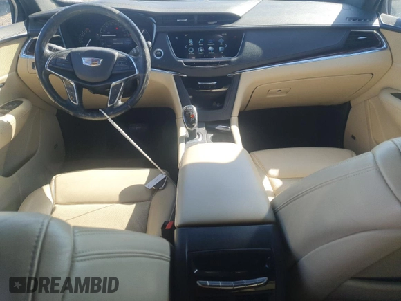 2019 Cadillac XT5 Premium Luxury AWD z VIN 1GYKNFRS5KZ252885, wystawiony jako Copart lot #49729865 z przebiegiem 54 593 mil mil oraz Szkoda całkowita • Salvage title. Historia ofert i sprzedaży dostępna na DreamBid. Obrazek 8.