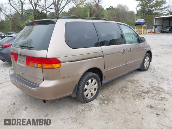 2004 Honda Odyssey EX with VIN 5FNRL18684B072343, listed as a IAAI auction lot 41945142 with 222,990 mi miles and . Bid and sale history available at DreamBid. Image 4.