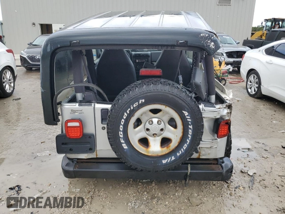 2002 Jeep Wrangler Sport with VIN 1J4FA49S32P733909, listed as a Copart auction lot 72776204 with 157,508 mi miles and Non Repairable. Bid and sale history available at carsss.com. Image 6.