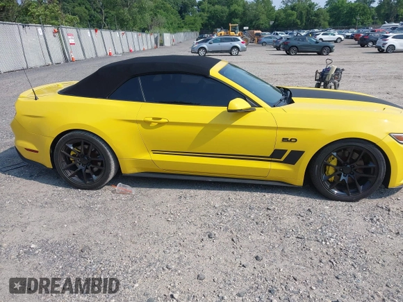 2015 Ford Mustang GT Premium z VIN 1FATP8FF9F5323726, wystawiony jako IAAI lot #42479740 z przebiegiem 68 581 mil mil oraz . Historia ofert i sprzedaży dostępna na DreamBid. Obrazek 6.