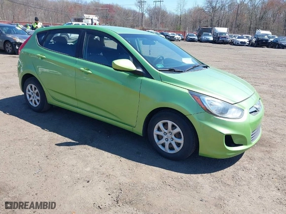 2014 Hyundai Accent GS with VIN KMHCT5AE0EU193502, listed as a IAAI auction lot 42036656 with 114,136 mi miles. Bid and sale history available at carsss.com. Image 1.