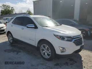 2020 Chevrolet Equinox Premier z VIN 2GNAXNEV5L6201364, wystawiony jako Copart lot #53293525 z przebiegiem Nie podano mil oraz Szkoda całkowita • Salvage title. Historia ofert i sprzedaży dostępna na DreamBid. Obrazek 4.