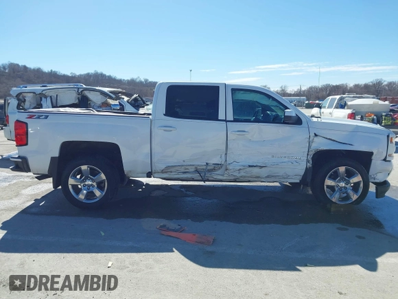 2018 Chevrolet Silverado 1500 LT with VIN 3GCUKREC3JG634354, listed as a IAAI auction lot 41734436 with 135,846 mi miles. Bid and sale history available at carsss.com. Image 13.
