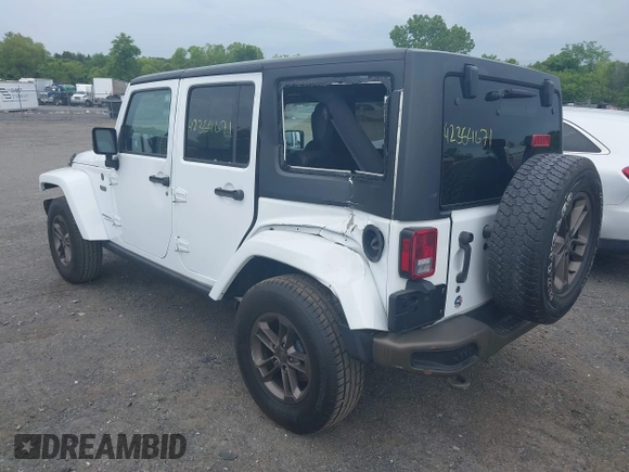 2017 Jeep Wrangler Unlimited 75th Anniversary z VIN 1C4HJWEG8HL502984, wystawiony jako IAAI lot #42354671 z przebiegiem 108 900 mil mil oraz . Historia ofert i sprzedaży dostępna na DreamBid. Obrazek 3.