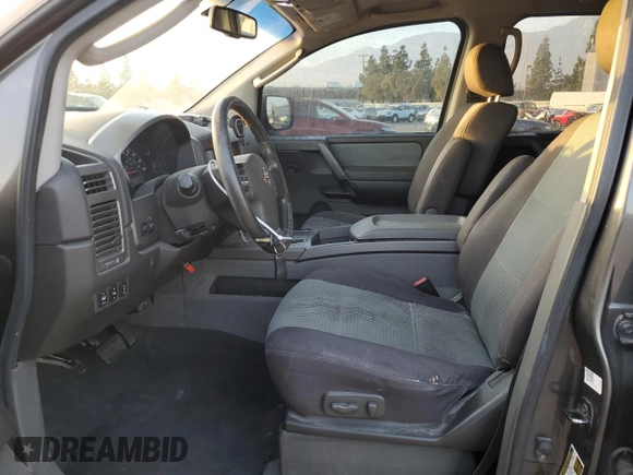 2007 Nissan Titan XE with VIN 1N6AA07A07N217705, listed as a Copart auction lot 86836804 with 272,228 mi miles and Salvage Title. Bid and sale history available at DreamBid. Image 7.
