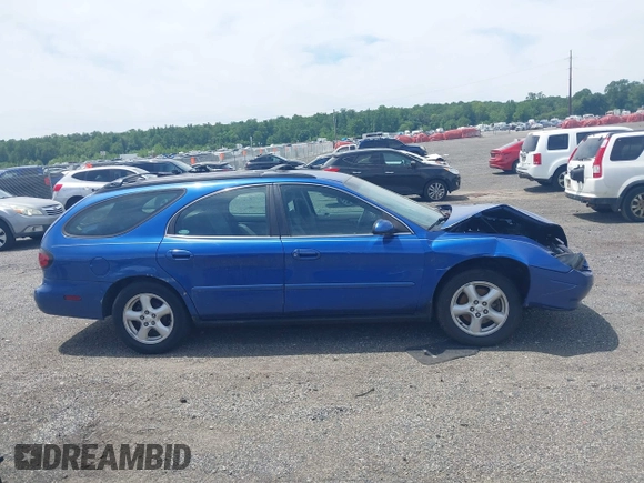 2003 Ford Taurus SE Standard z VIN 1FAFP58U93A171652, wystawiony jako IAAI lot #42314064 z przebiegiem 116 697 mil mil oraz . Historia ofert i sprzedaży dostępna na DreamBid. Obrazek 13.