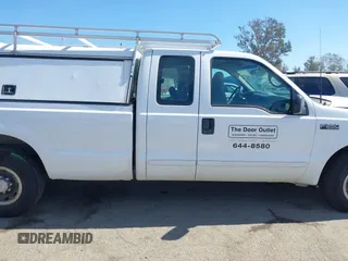 2001 Ford Super Duty F-250 XL with VIN 1FTNX20S11EA60775, listed as a IAAI auction lot 41631692 with 151,485 mi miles. Bid and sale history available at carsss.com. Image 13.