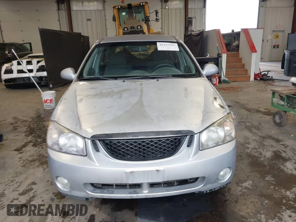 2006 Kia Spectra with VIN KNAFE161X65283615, listed as a IAAI auction lot 41955968 with 185,177 mi miles. Bid and sale history available at carsss.com. Image 12.