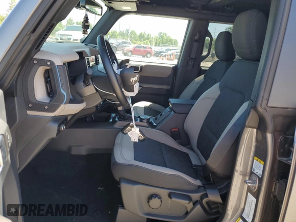 2023 Ford Bronco with VIN 1FMEE5DP6PLB66975, listed as a Copart auction lot 57536014 with 11,883 mi miles and Salvage Title. Bid and sale history available at DreamBid. Image 7.