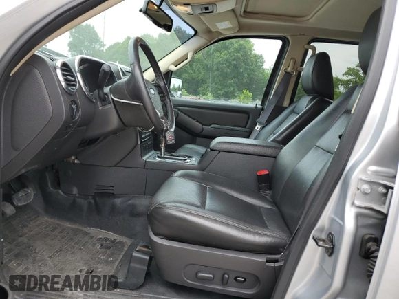 2010 Ford Explorer Sport Trac with VIN 1FMEU2D86AUA04257, listed as a Copart auction lot 60132315 with 116,941 mi miles and Salvage title. Bid and sale history available at DreamBid. Image 7.
