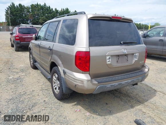 2004 Honda Pilot EX with VIN 2HKYF18434H575250, listed as a IAAI auction lot 42219882 with 196,515 mi miles and . Bid and sale history available at carsss.com. Image 3.