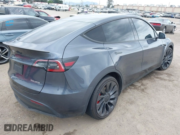 2023 Tesla Model Y Performance z VIN 7SAYGDEF1PF925274, wystawiony jako IAAI lot #42078813 z przebiegiem 20 422 mil mil oraz . Historia ofert i sprzedaży dostępna na DreamBid. Obrazek 4.