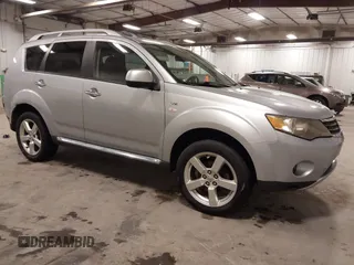 2009 Mitsubishi Outlander XLS z VIN JA4MT41X99Z011321, wystawiony jako IAAI lot #41854507 z przebiegiem 247 056 mil mil oraz . Historia ofert i sprzedaży dostępna na DreamBid. Obrazek 1.